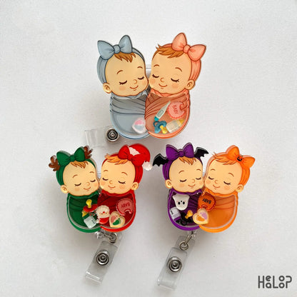 Swaddle baby shaker badge reel set