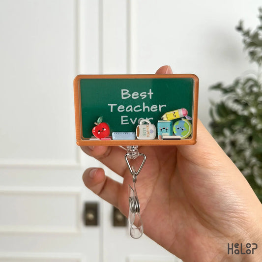 Teacher badge reel featuring chalkboard design school supplies and classroom charms