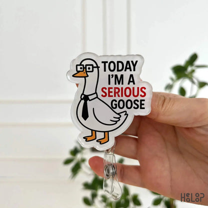 “Today I’m a Serious Goose” acrylic badge reel with cute cartoon goose design