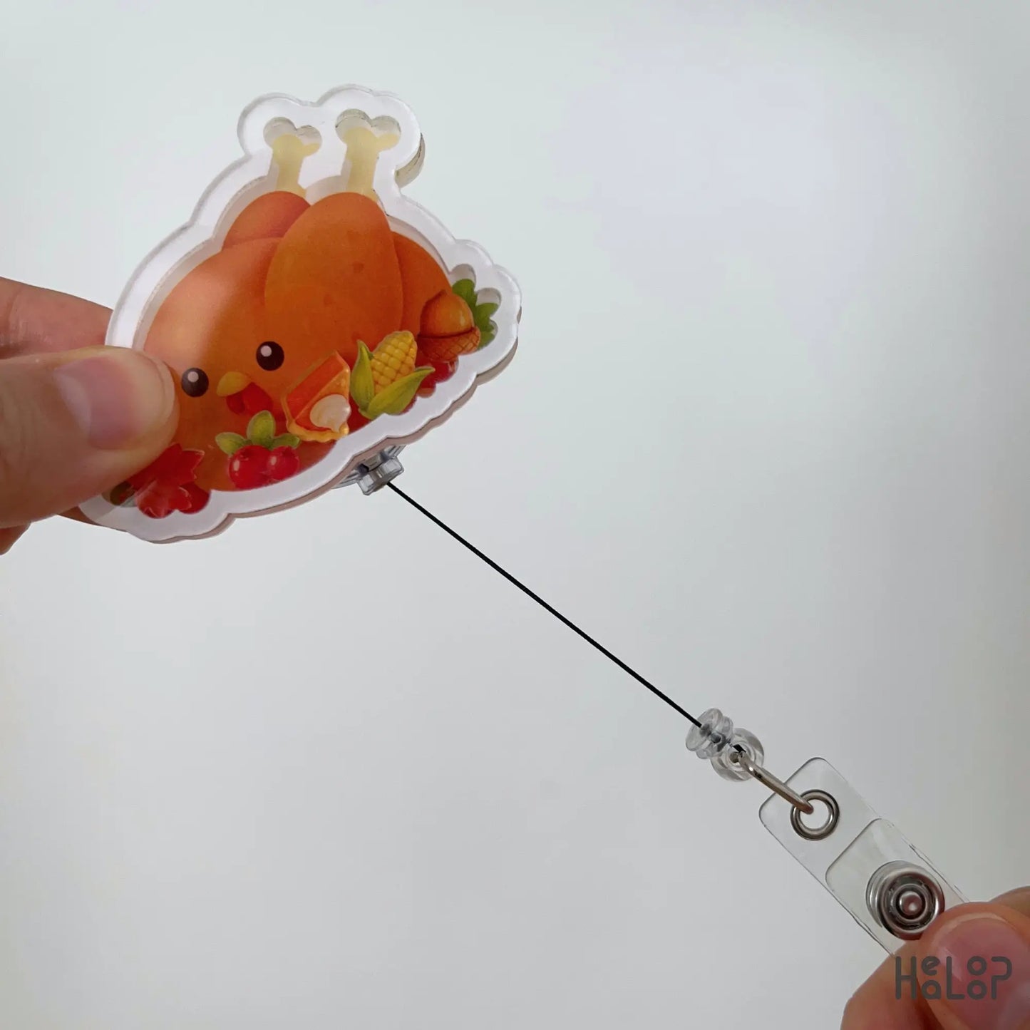 Turkey Food Shaker Badge Reel demonstrating retractable badge reel cord with adorable Thanksgiving turkey design