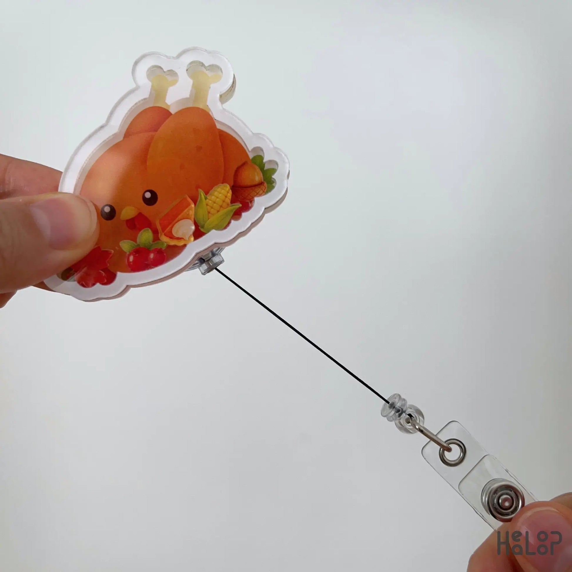 Turkey Food Shaker Badge Reel demonstrating retractable badge reel cord with adorable Thanksgiving turkey design