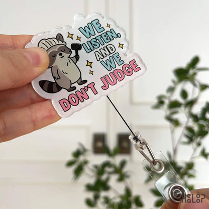 “We Listen and We Don’t Judge” Badge Reel – cute raccoon retractable ID holder for therapists and nurses